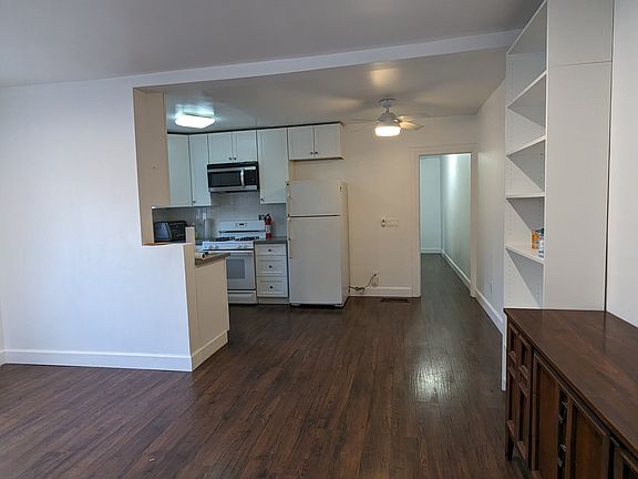 Kitchen from front door/ Living room