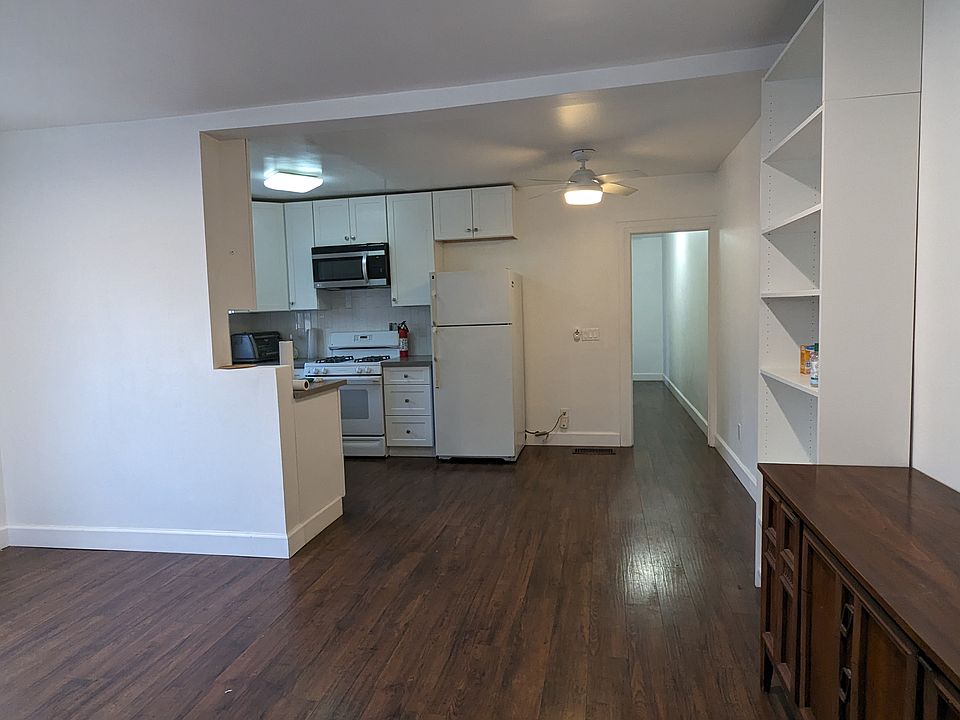 Kitchen from front door/ Living room