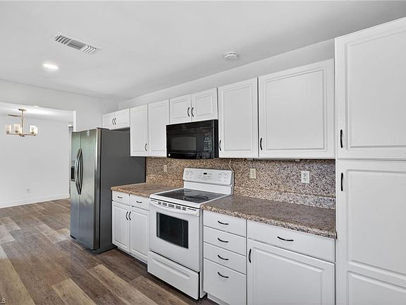 4th image of 9090 San Carlos BLVD