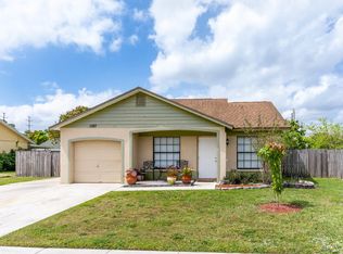 1387 Denlow Ln, Royal Palm Beach, FL 33411