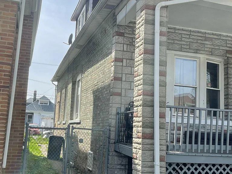 7636 S Eberhart Ave — Photo 1