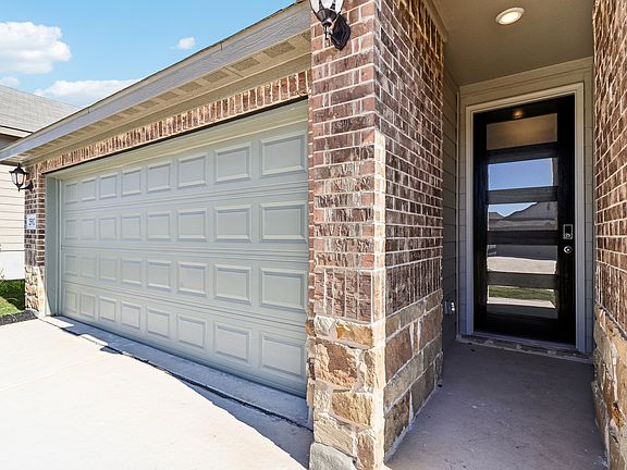 Front exterior of the Allen floorplan at a Meritage Homes community.