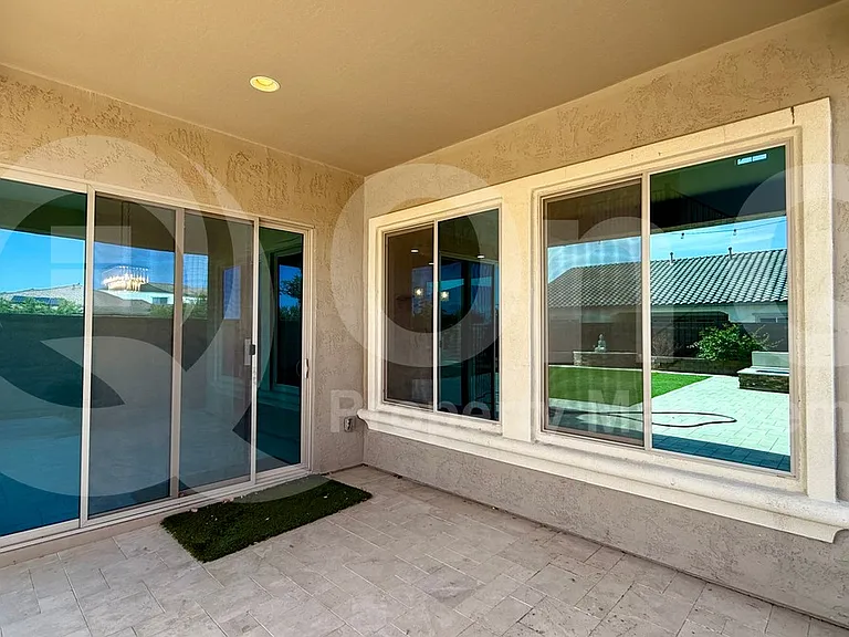 9707 W Patrick Ln — Photo 38