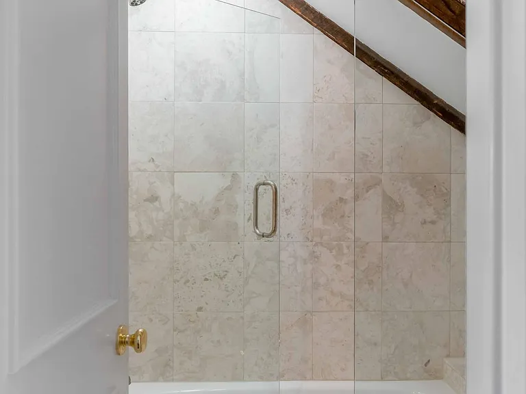 Fourth floor guest bath shower (en suite).