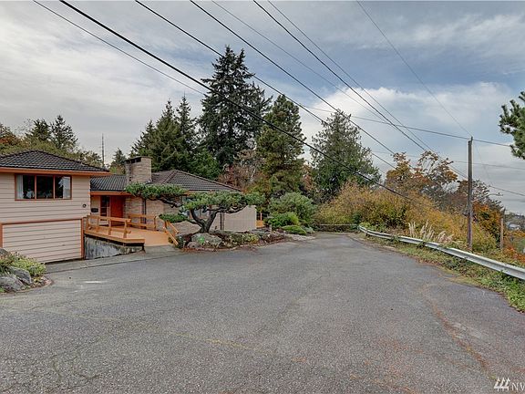 House bordering Scmitz Preserve  Park at the end of SW Stevens St