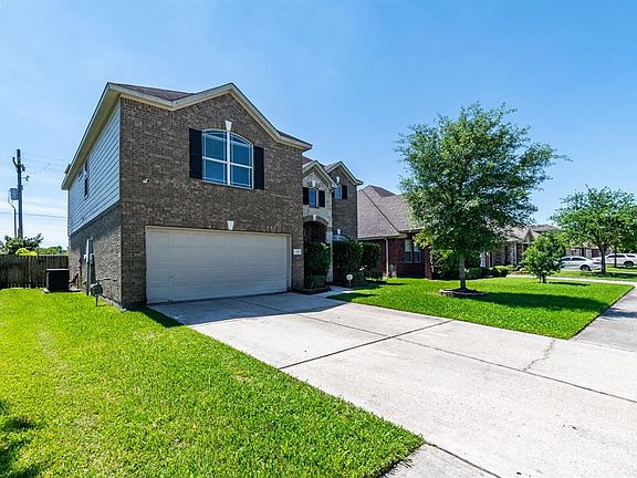 The double wide driveway and 2 car attached garage provide plenty of parking.