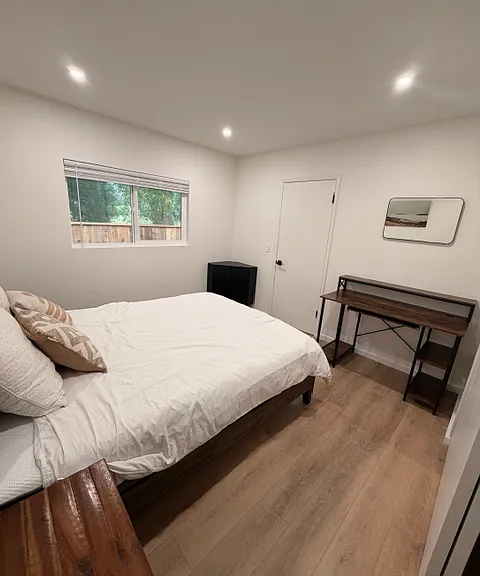 Behind art is a plug, if you wanted to add a tv. Chair for desk is included