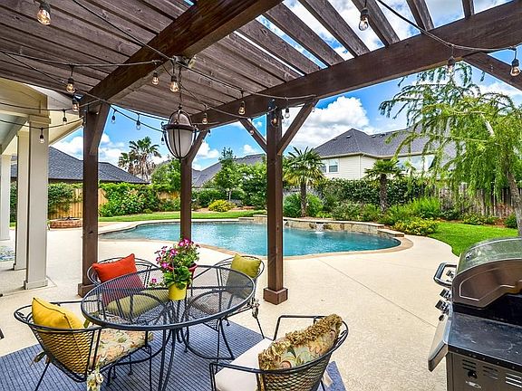This Pergola adds additional seating and sun coverage for extended backyard enjoyment!