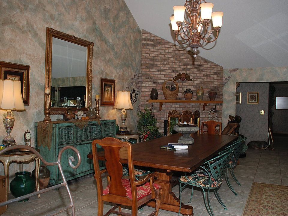 Formal Dining Room w/ brick fireplace