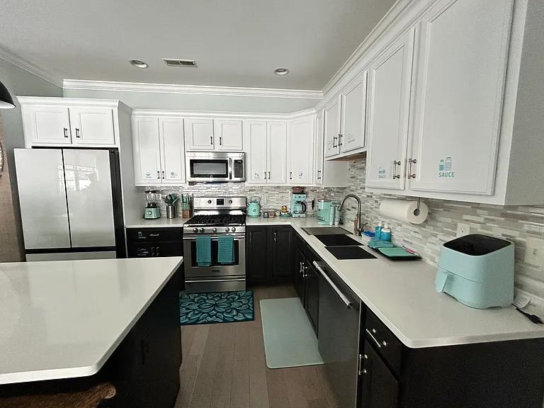 Fully equipped kitchen with Samsung appliances.