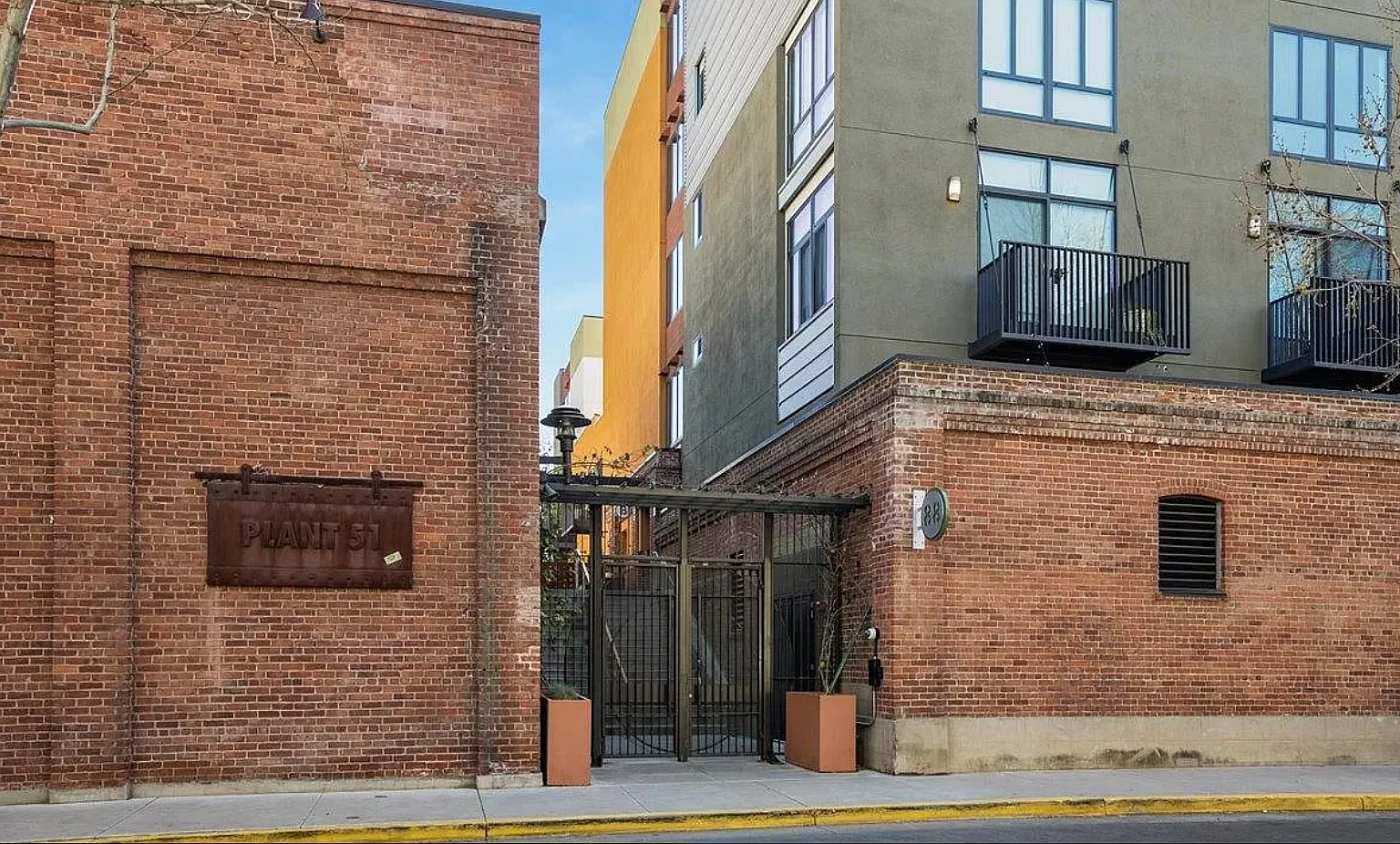 Outside building entrance with secured gate