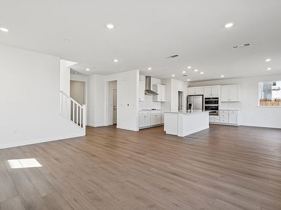 Gathering room open to kitchen and cafe