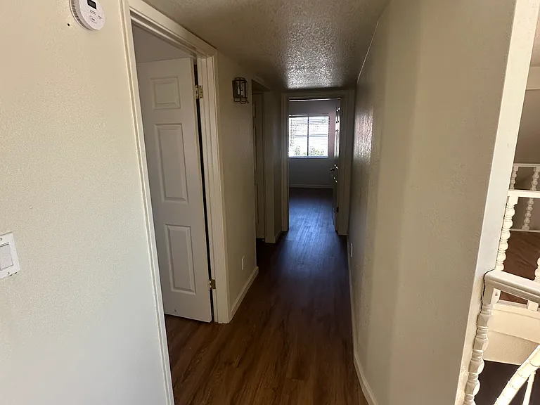 hallway to upstairs bedrooms 1, 2 & full bathroom