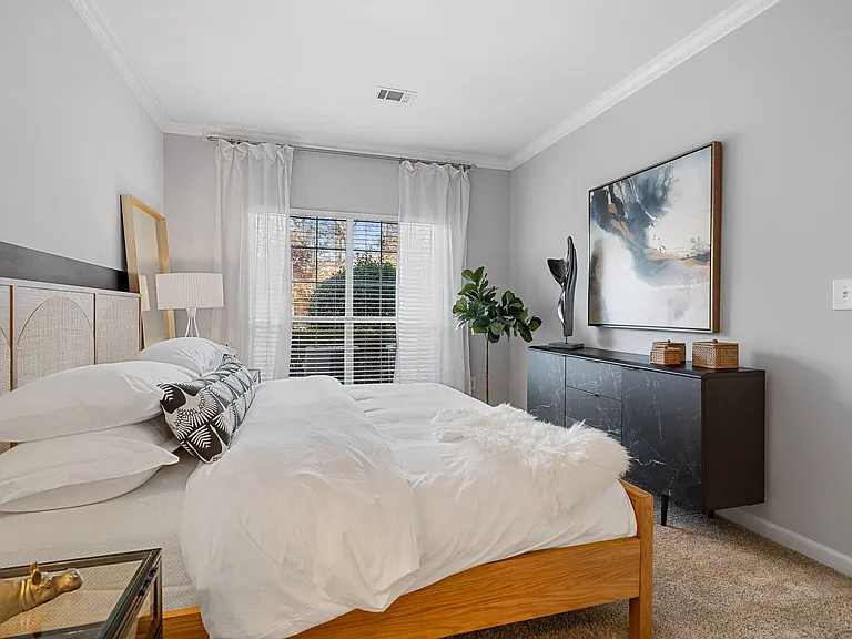 Beautiful bedroom at Hawthorne at the Carlyle in Greenville, SC