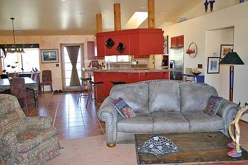 Great room with sit-up bar in kitche, dining area, FP in LR