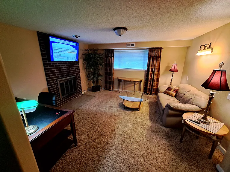 bedroom fireplace and 50" TV