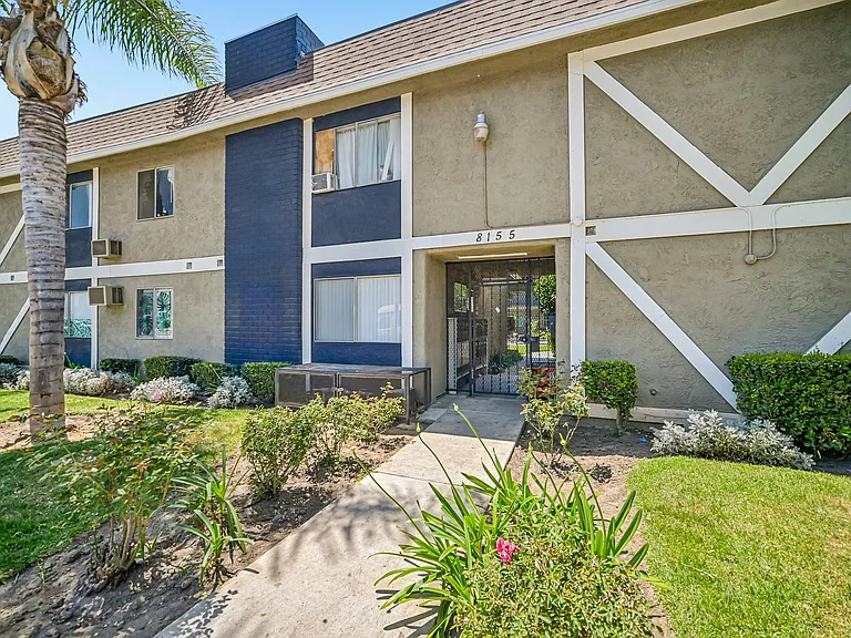 Inviting entryway with gated access, offering added comfort and peace of mind.