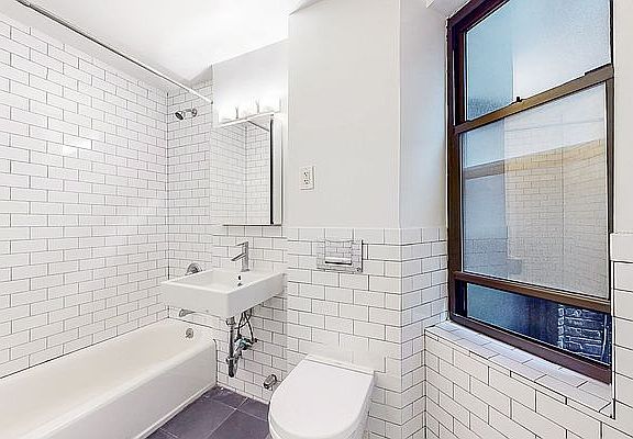 5th image of 226 E 87th St APT 3A