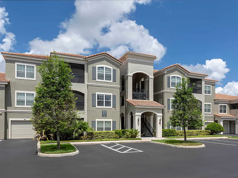 Building exterior with convenient parking and attached garages