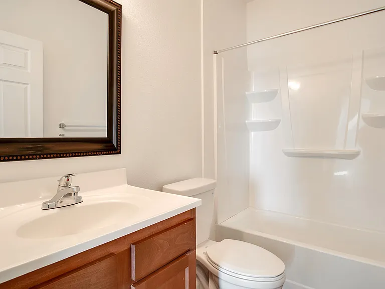 All bathrooms have similar finishes, the layouts vary somewhat.