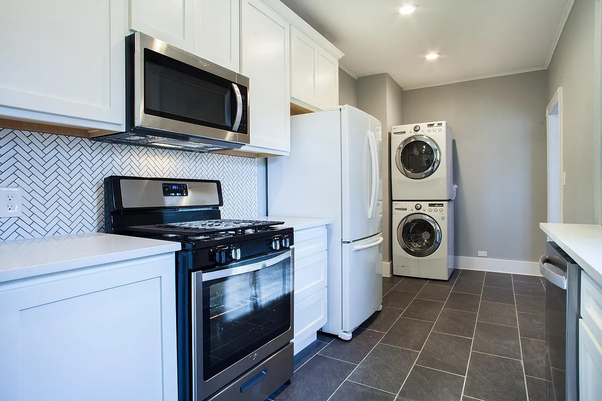 French door refrigerator with built in trash/ recycling cabinets and pull out drawers for pan storage! - 121 E Norwood Ct #2