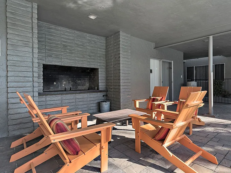 Enjoy the warmth of the fireplace while sitting with friends