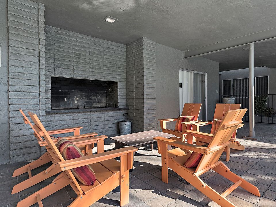 Enjoy the warmth of the fireplace while sitting with friends
