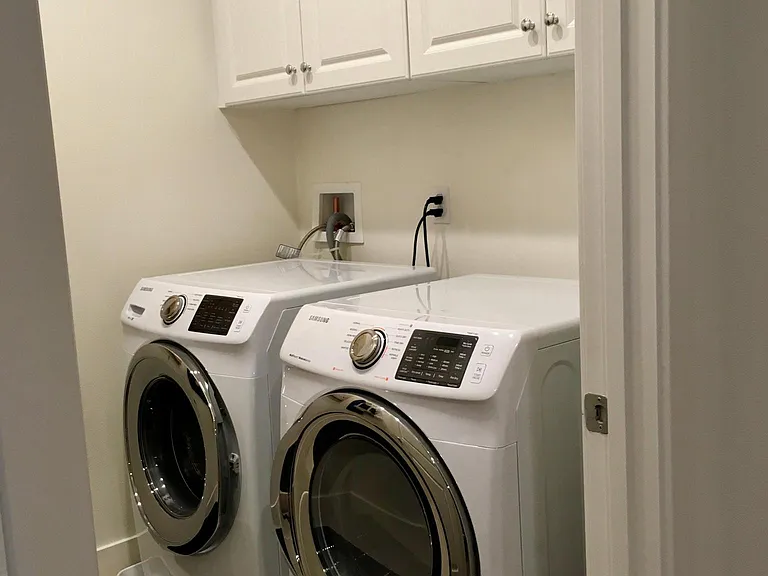 Laundry room with washer and dryer