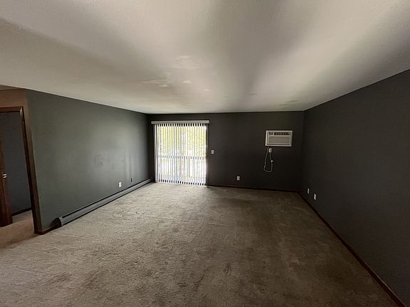 The living room and slider door to the balcony.
