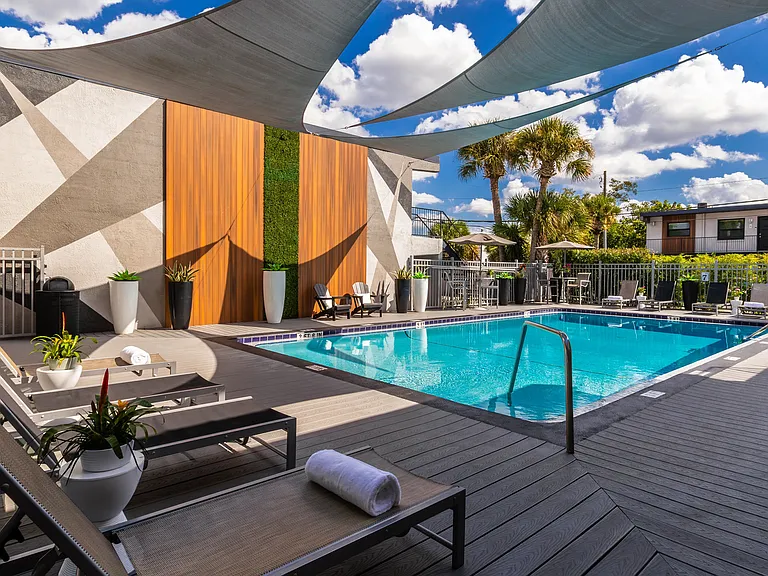 With a modern design, shaded areas, and serene surroundings, these comfortable loungers offer the perfect spot for relaxation under the Florida sun.