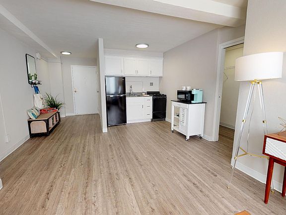Interiors-Open living area with hardwood floors