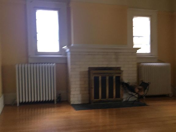 Large living room has 12 foot ceilings! Don't worry...we pay the heating bill...