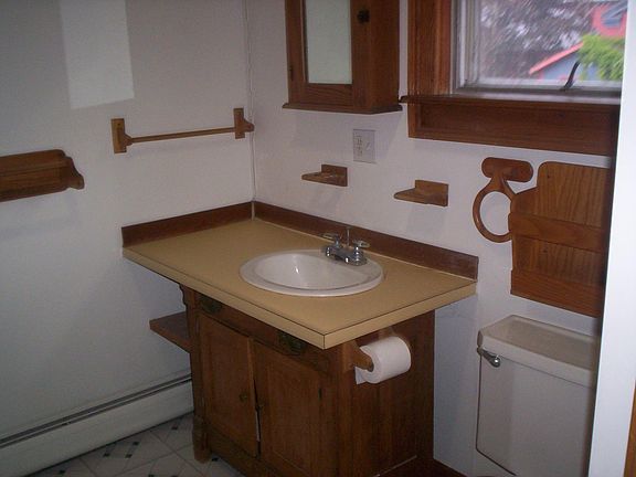 bathroom with shower and tub