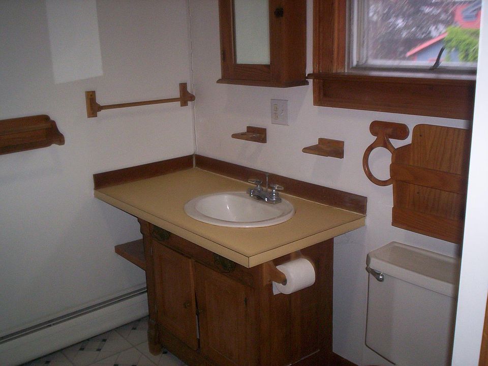 bathroom with shower and tub