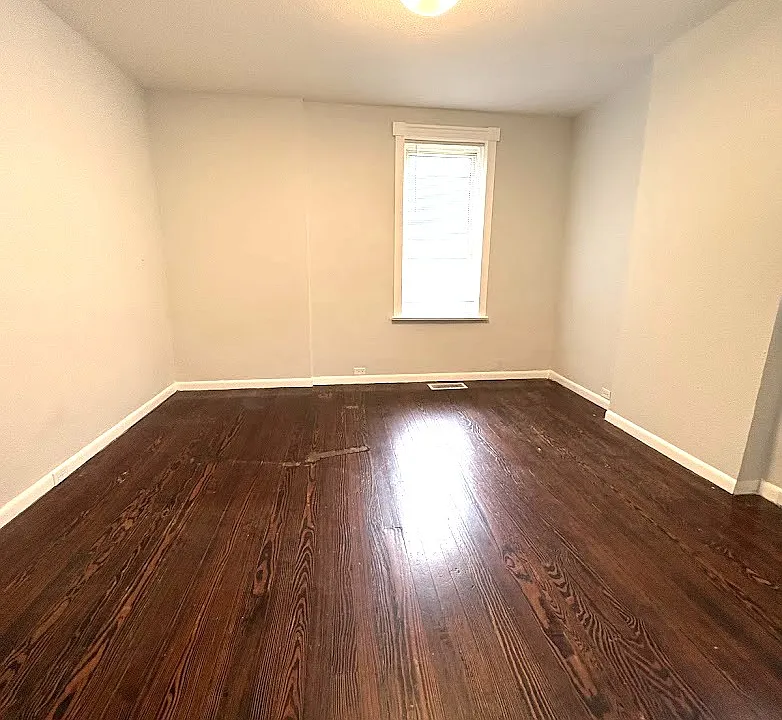 master bedroom with with walk in closet