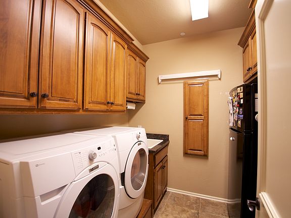Laundry room w/ironing board