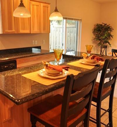 Visit with family and friends while cooking in the kitchen. Bar counter overhangs allowing for sitti