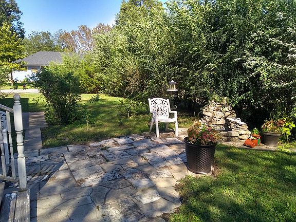 Side yard with small pond