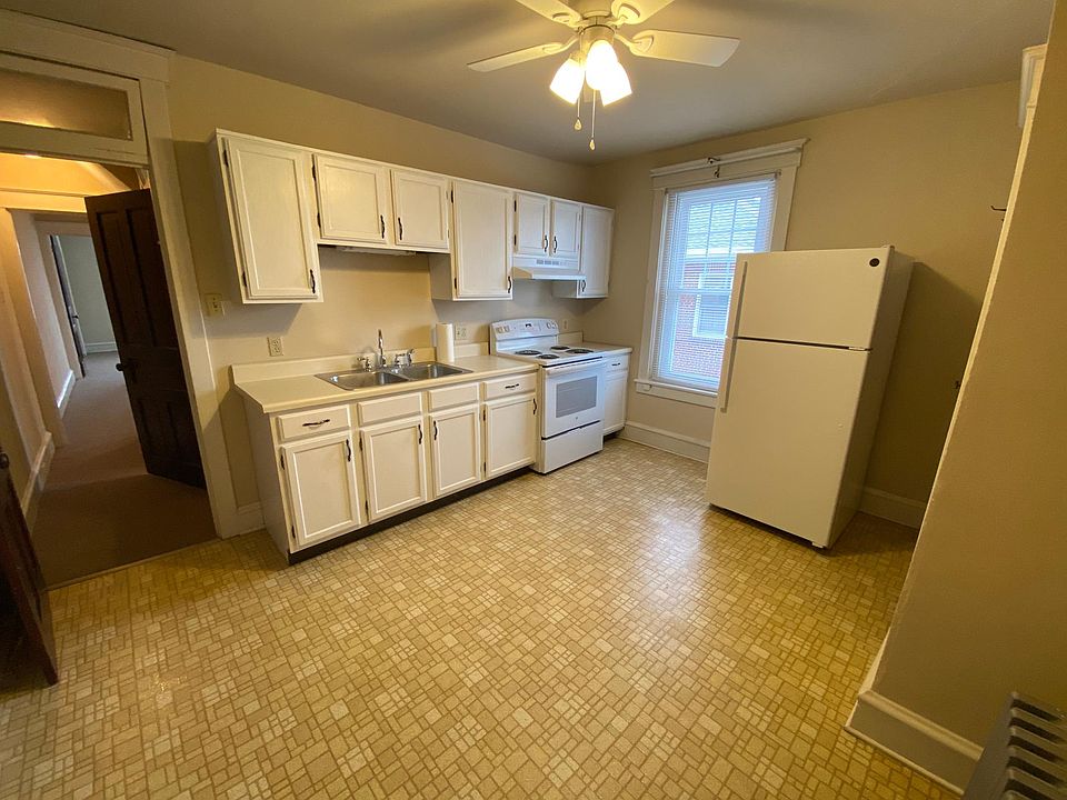 Eat in kitchen with brand new appliances and ceiling fan