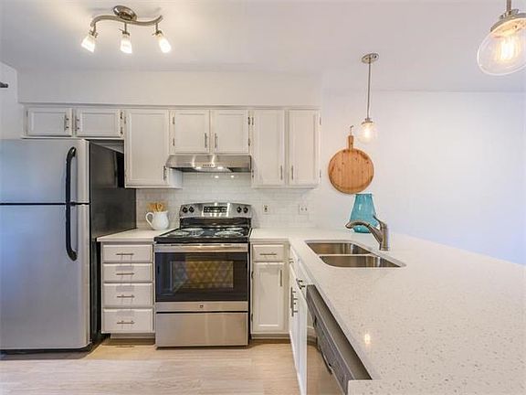 Fresh paint, new hardware and new gorgeous pendant lighting.