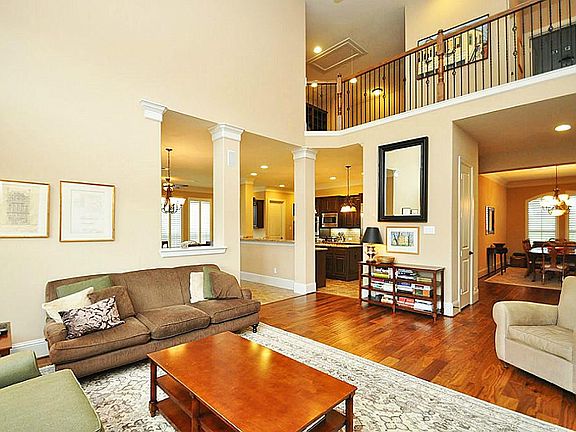 Another view of family room from kitchen,breakfast area and 2nd floor.