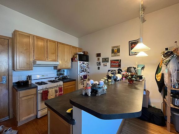 5th image of 624 E Ogden Ave APT 303