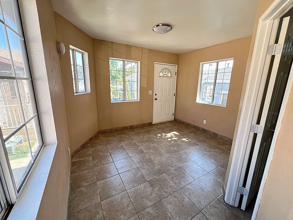 2nd Bedroom from a different angle and a door entrance or exit.