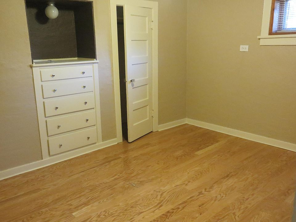 Bedroom with built in and two closets