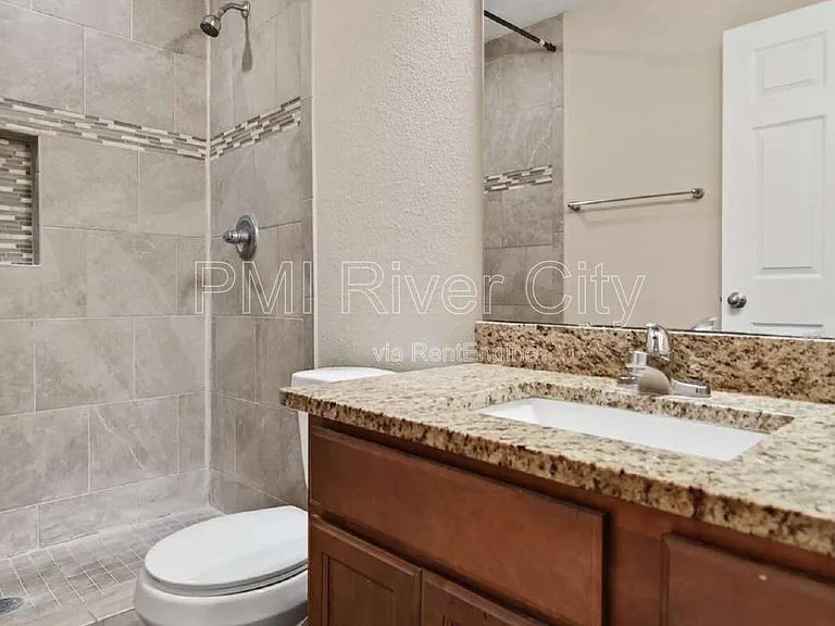 7608 Rain Forest Dr N — Photo 27