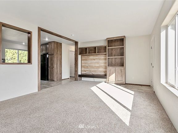 Open floor plan from kitchen to living room.