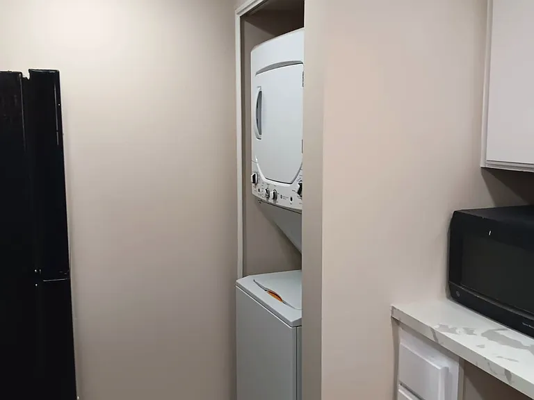 Washer dryer and microwave.