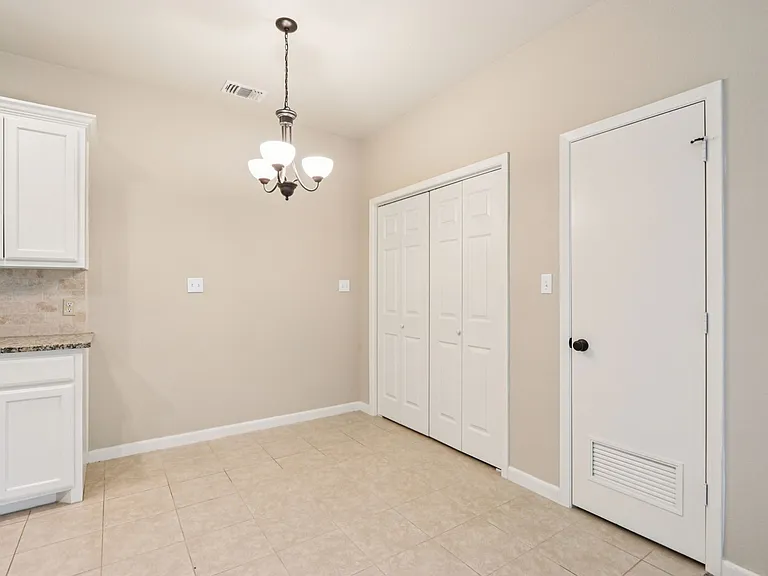 B2 - DUPLEX - 2BD, 2BA - 1054SF - Dining Room/Laundry
