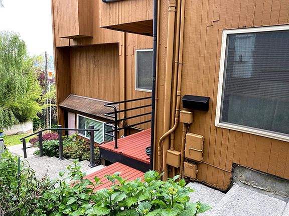 Private apartment entrance is at the pink door