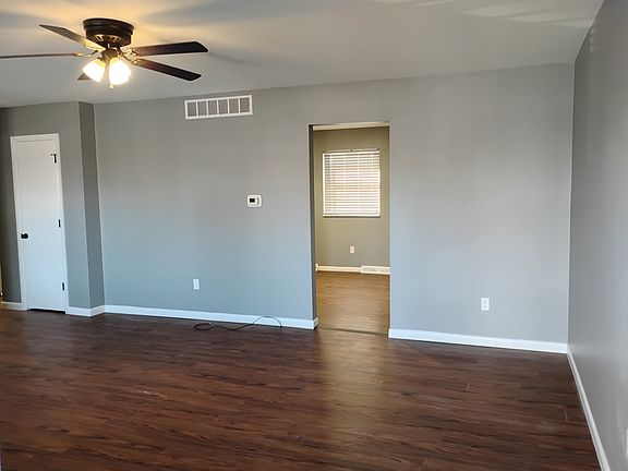 Upstairs living room facing kitchen